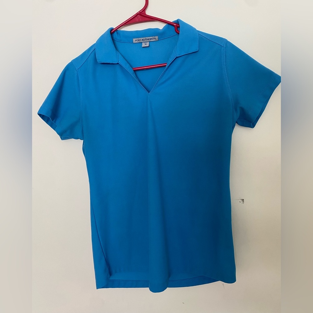 Port Authority woman’s like new baby blue polo